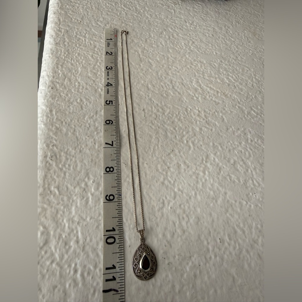 Elegant Silver and Garnet Teardrop Pendant Necklace - Picture 5 of 8